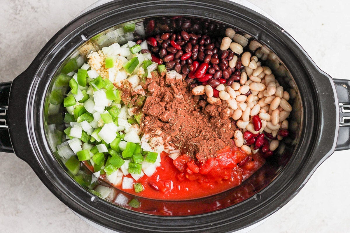 add all vegan chili ingredients to a slow cooker