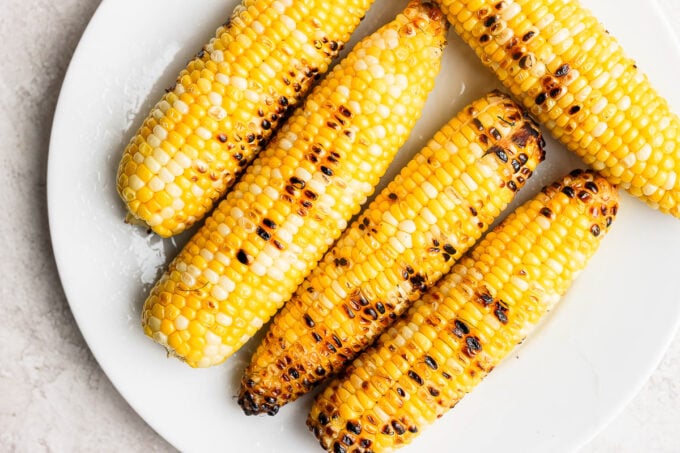 charred corn on the cobb