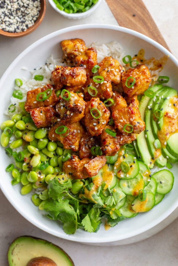 Crispy tofu bowls with edamame, cucumbers and avocado.