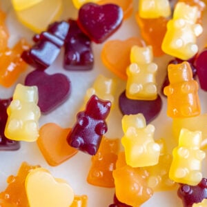 Vegan gummy bears that are yellow, orange and red.