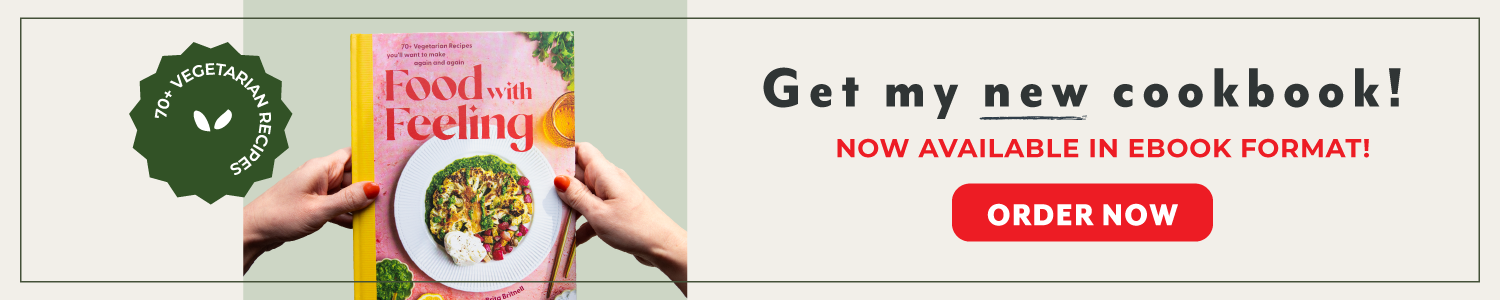 Banner with a hand holding the "food with feeling cookbook" with a link to buy the book