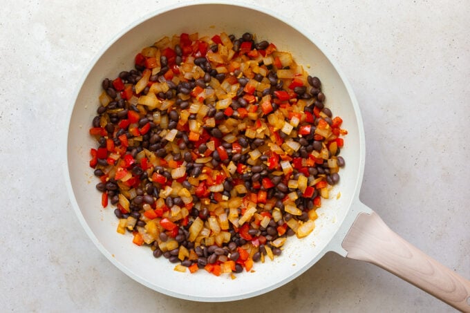 how to make vegetarian breakfast burritos: sautéing the veggies