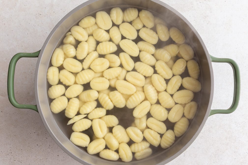 gnocchi cooking in a large pot