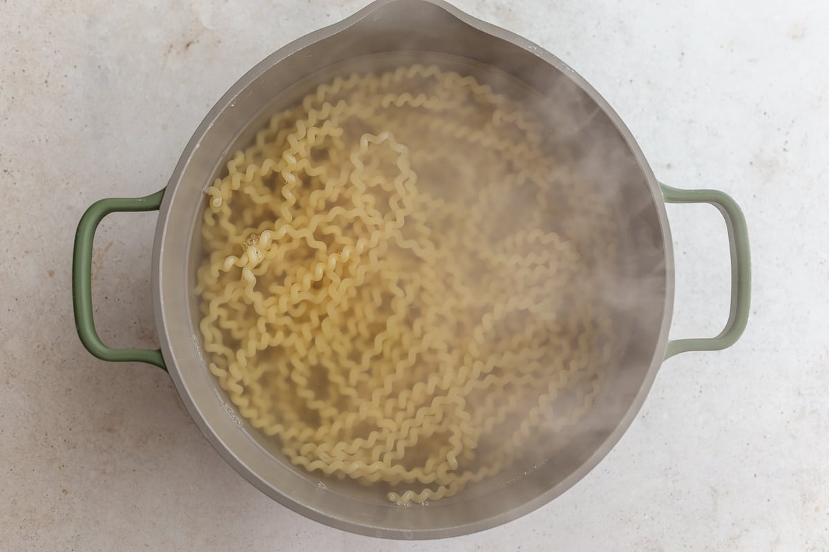 how to make ricotta pasta: cook your pasta and then drain and set aside