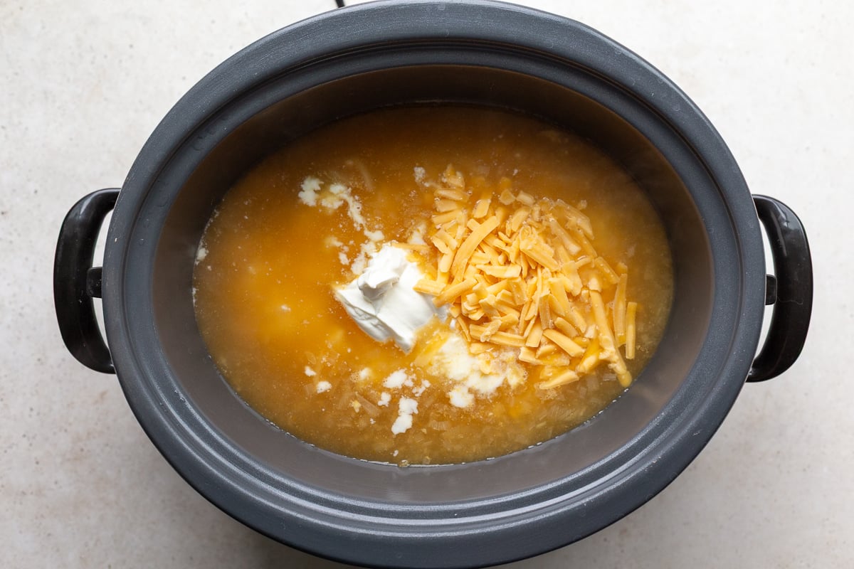 ingredients in a crockpot to make potato soup