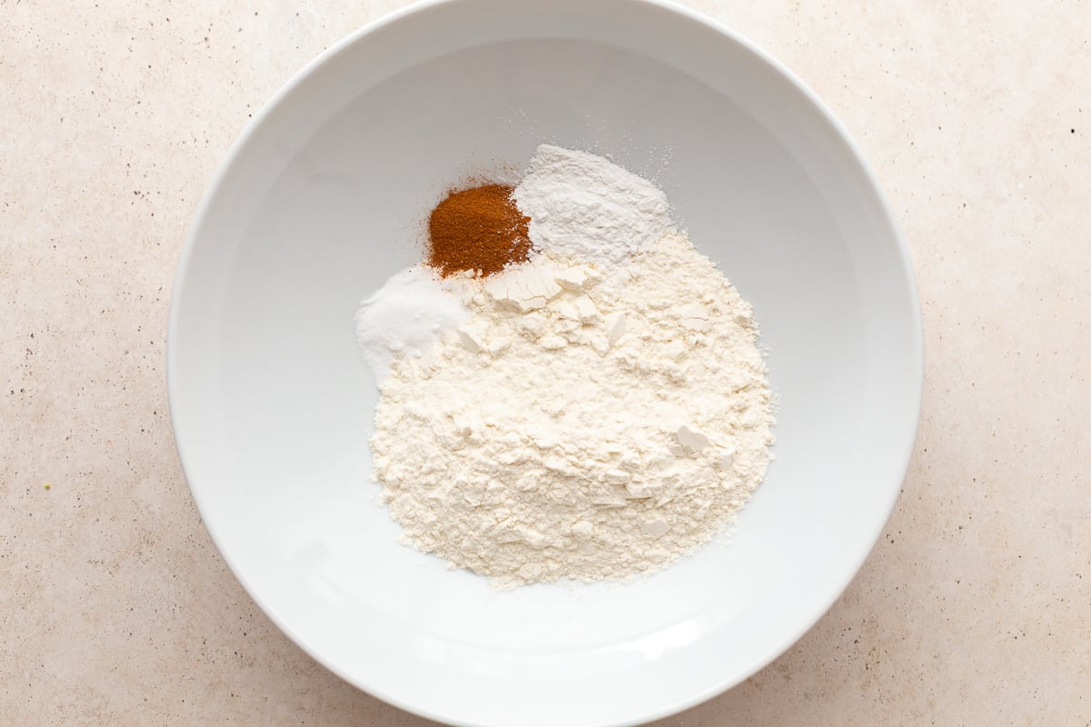 flour and cinnamon in a bowl for vegan muffins
