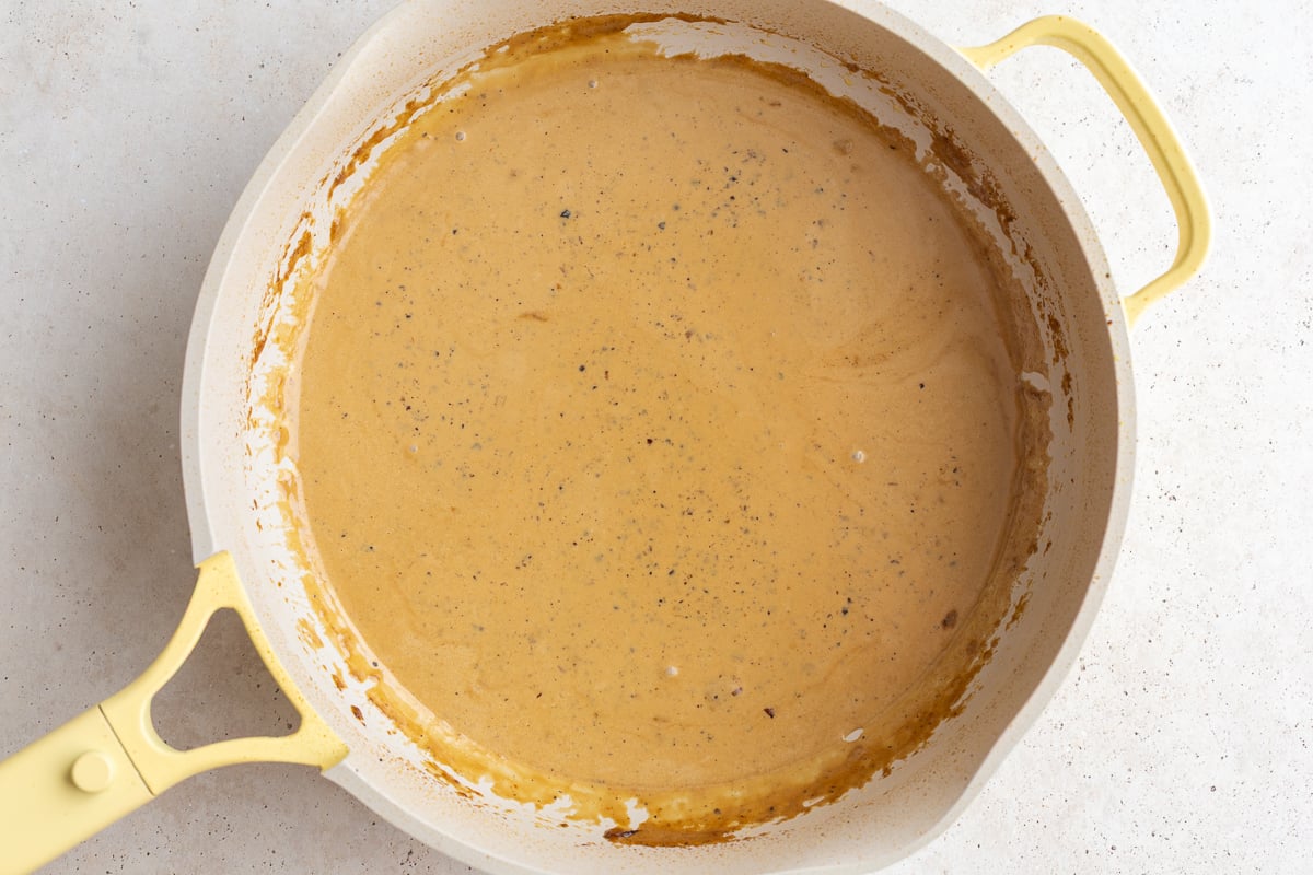 creamy peppercorn sauce in a pan