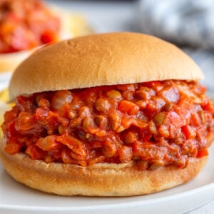 lentil sloppy joes on a bun with another in the background