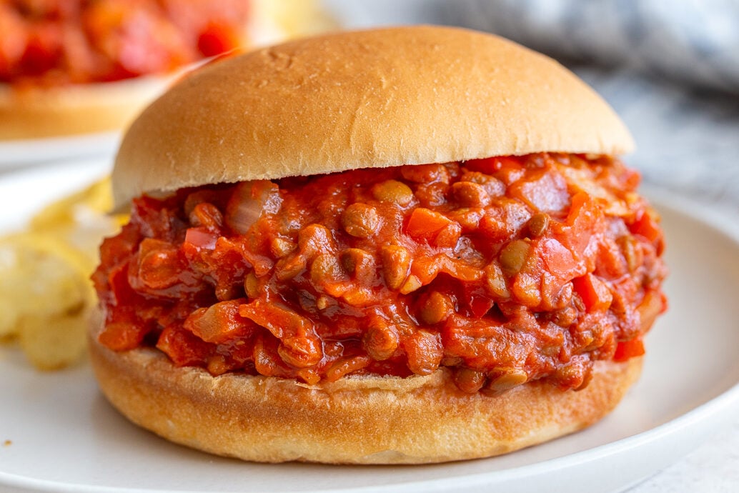lentil sloppy joes on a bun with another in the background
