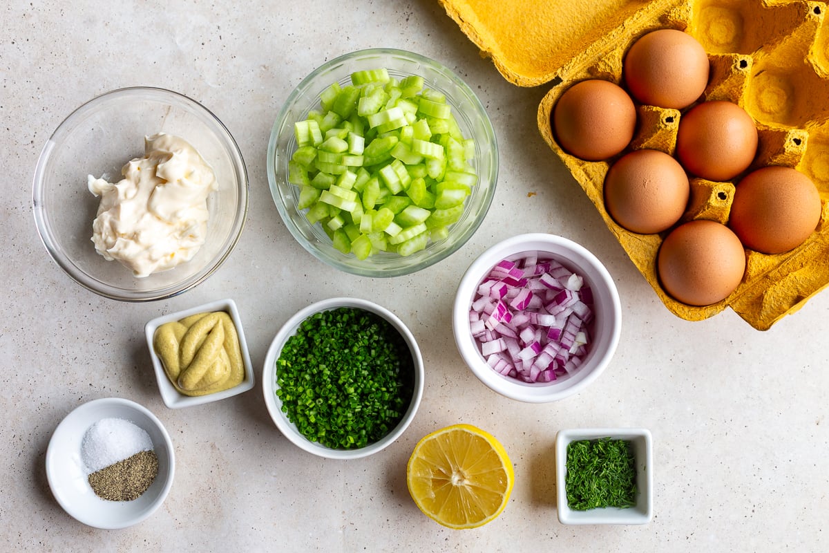 ingredients need to make egg salad sandwiches including hard boiled eggs, mayo, chives, red onion, celery etc
