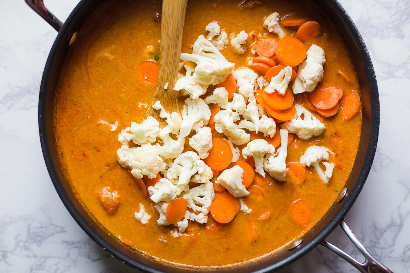 cauliflower and carrots in tikka masala sauce