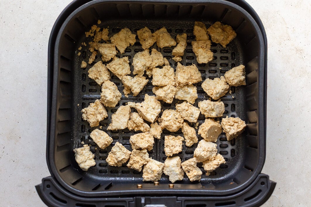 tofu chunks in an air fryer