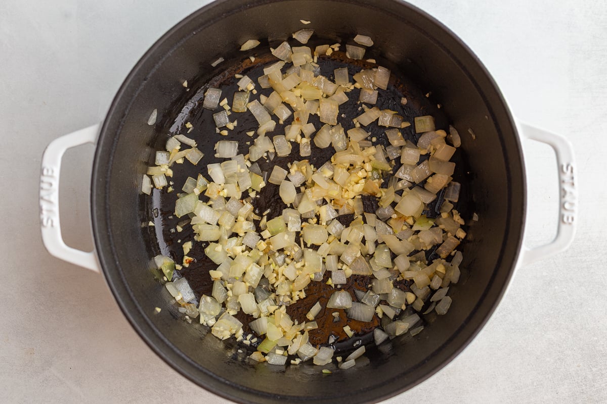 saut&eacute;ed onions in a cast iron pot