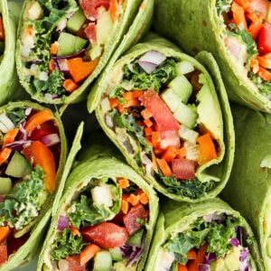 veggie wraps filled with hummus and rainbow veggies