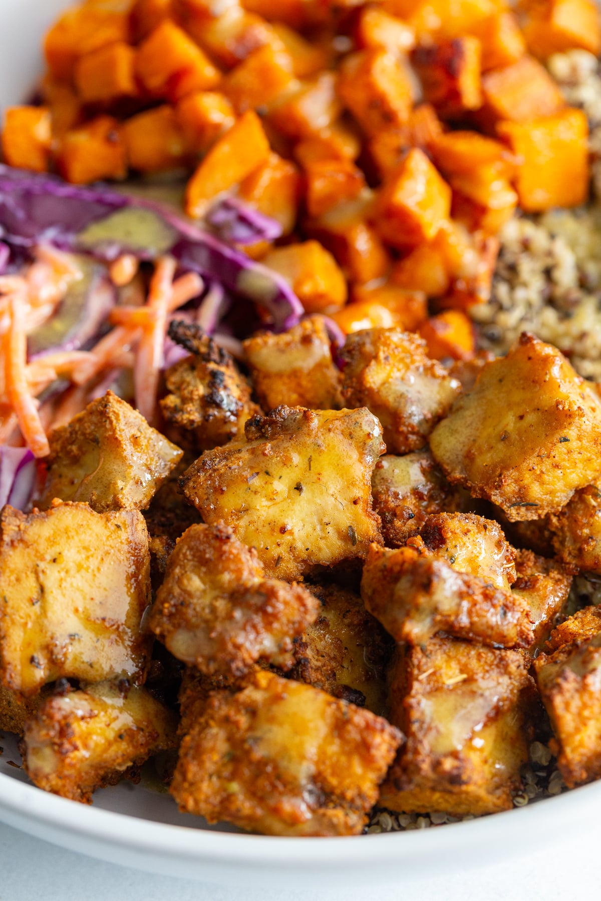 hot honey tofu bowls with coleslaw and sweet potato