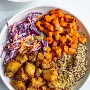 hot honey tofu bowls with sweet potato, quinoa and coleslaw