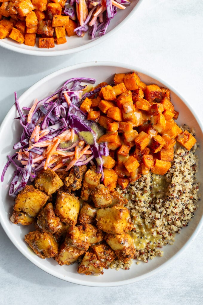 hot honey tofu bowls with sweet potato, quinoa and coleslaw
