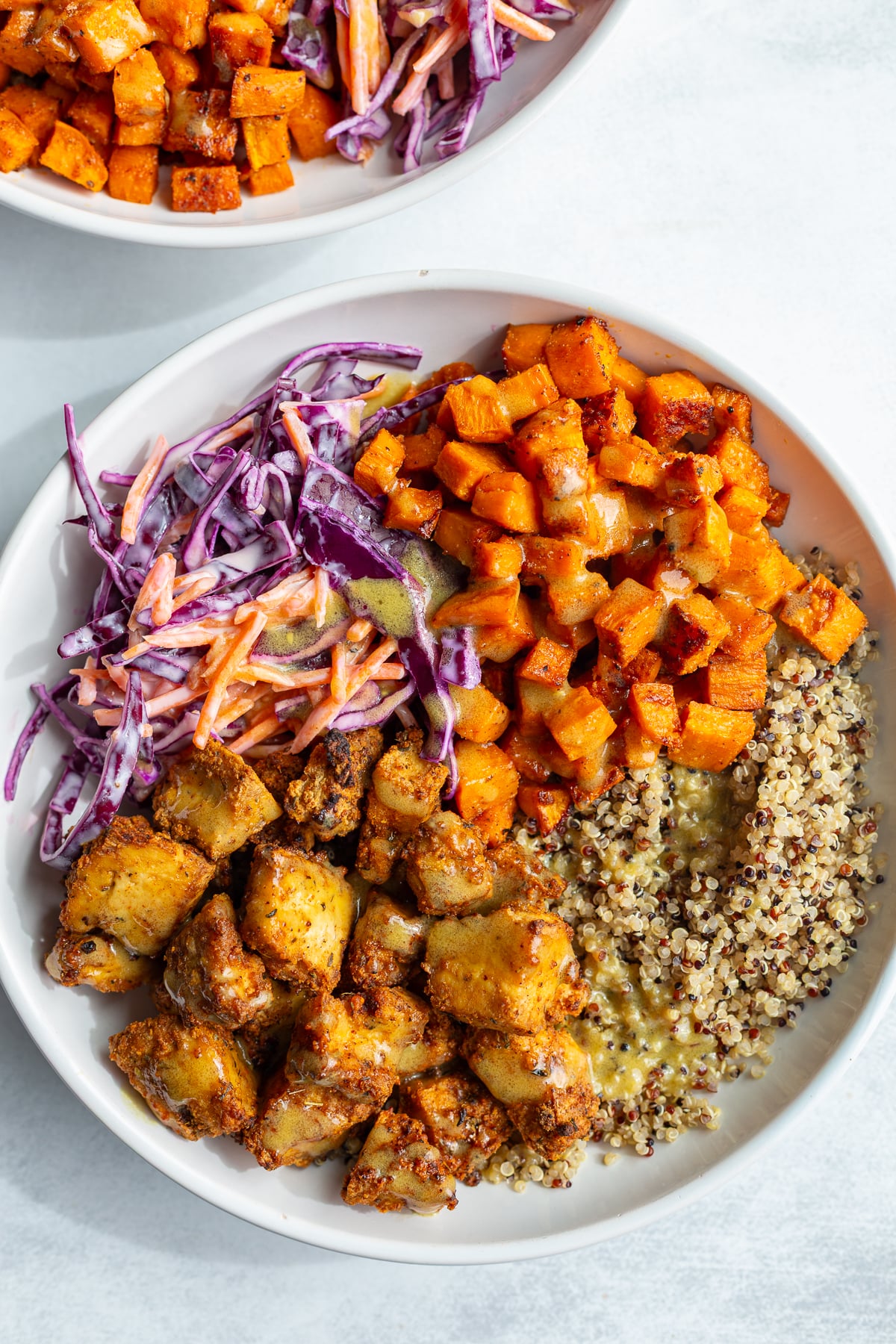hot honey tofu bowls with sweet potato, quinoa and coleslaw