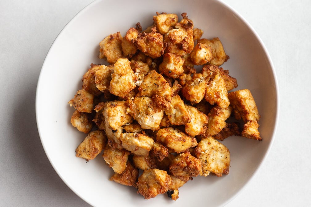 crispy air fryer tofu in a large bowl