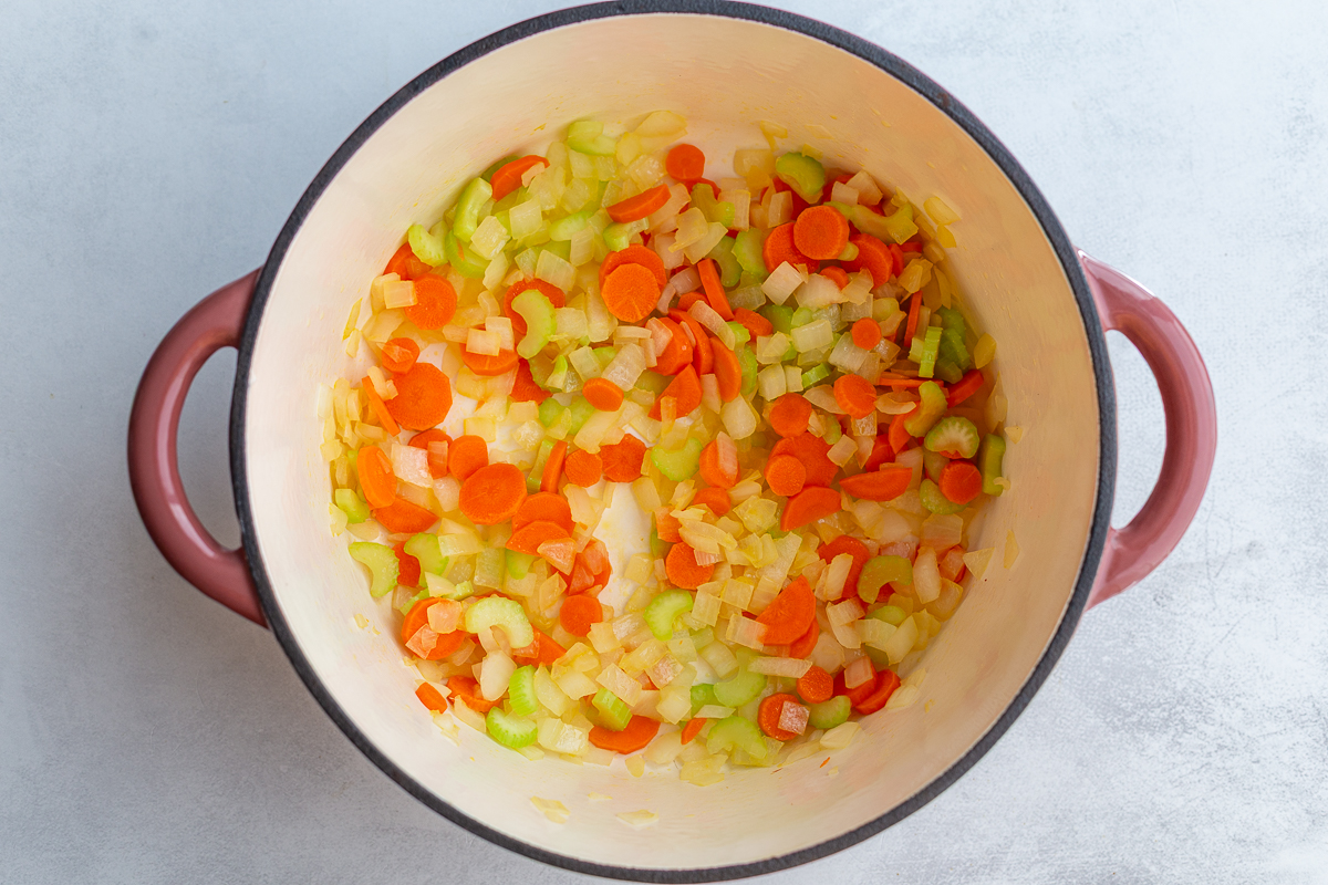 celery, onion, and carrots sauted in a large pot
