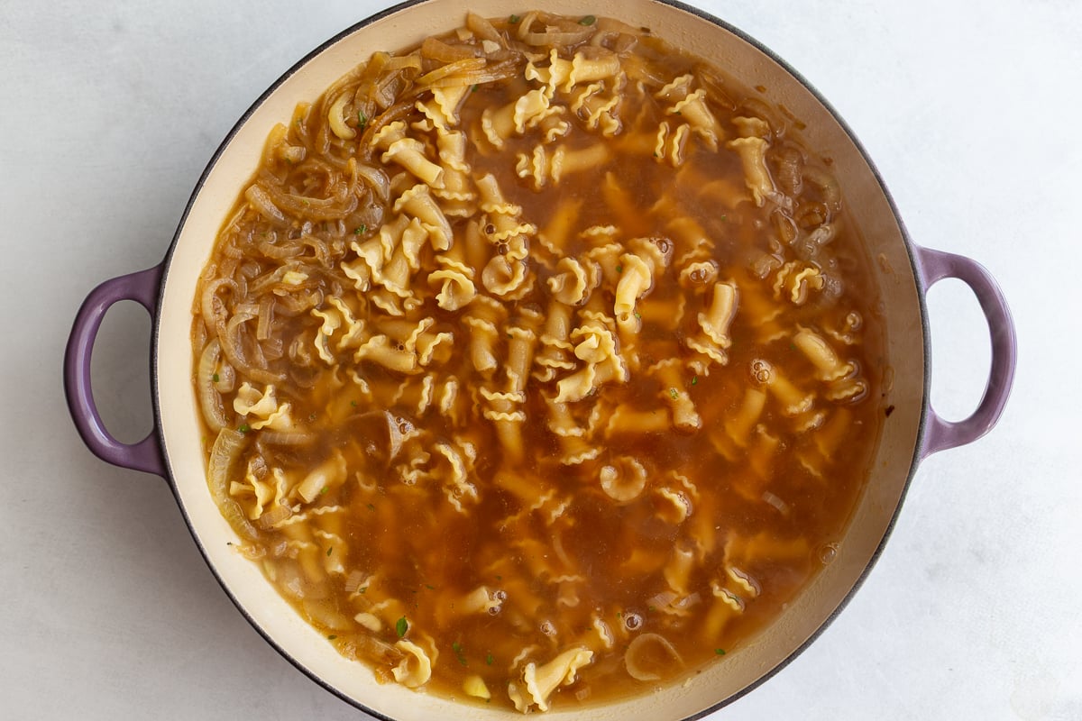 french onion pasta in a pot before the pasta has been fully cooked