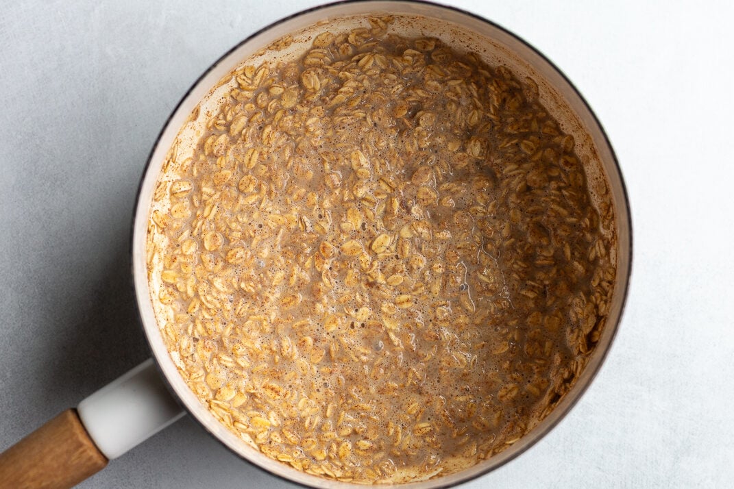 cinnamon oatmeal in a white pot
