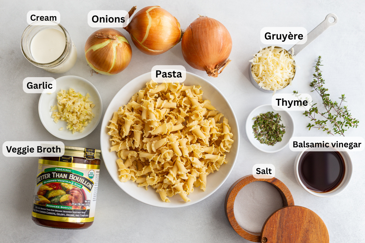 ingredients for french onion pasta including pasta, onions, garlic, cream, thyme etc
