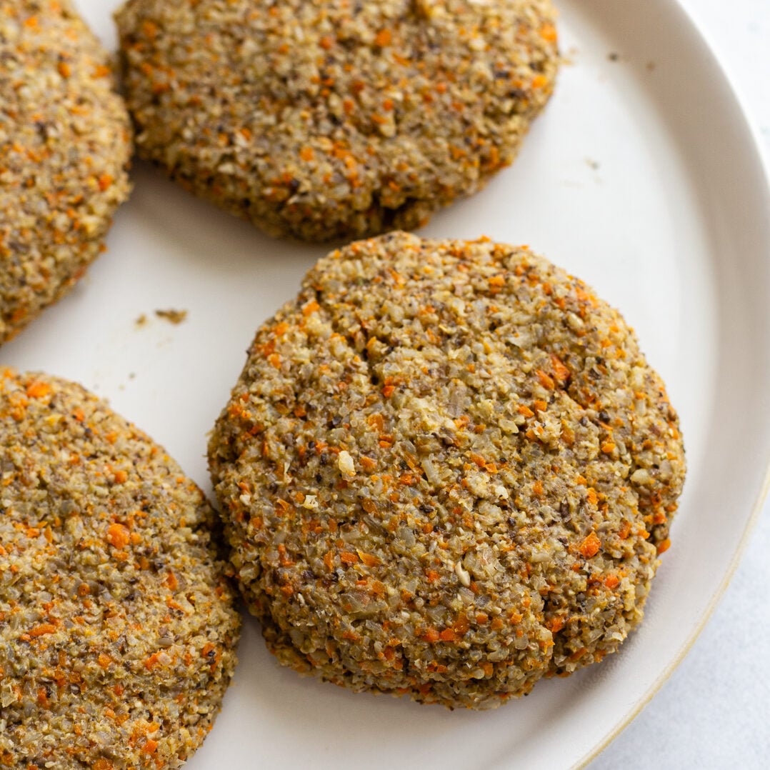 grilled veggie burger patties on a plate 