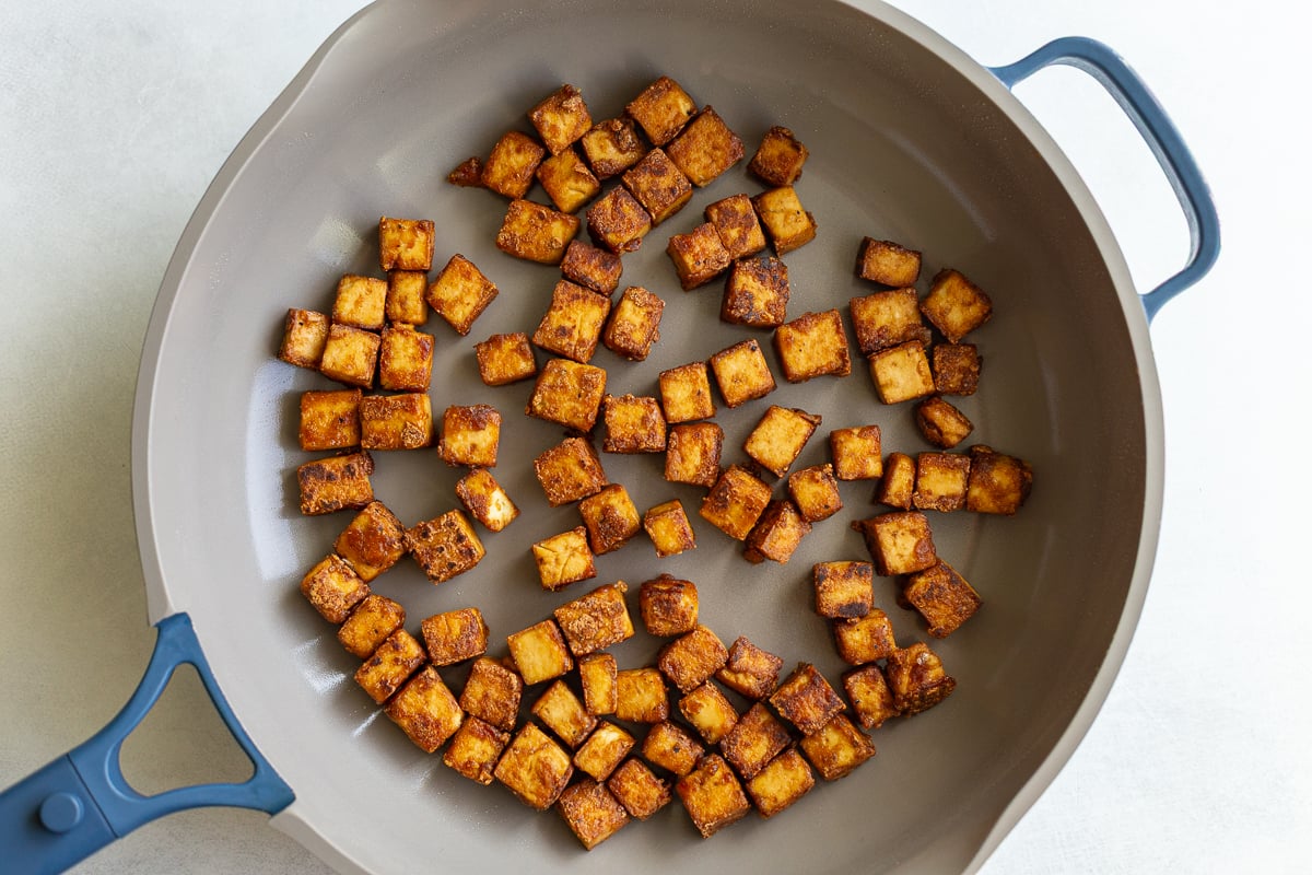 crispy tofu in a large skillet