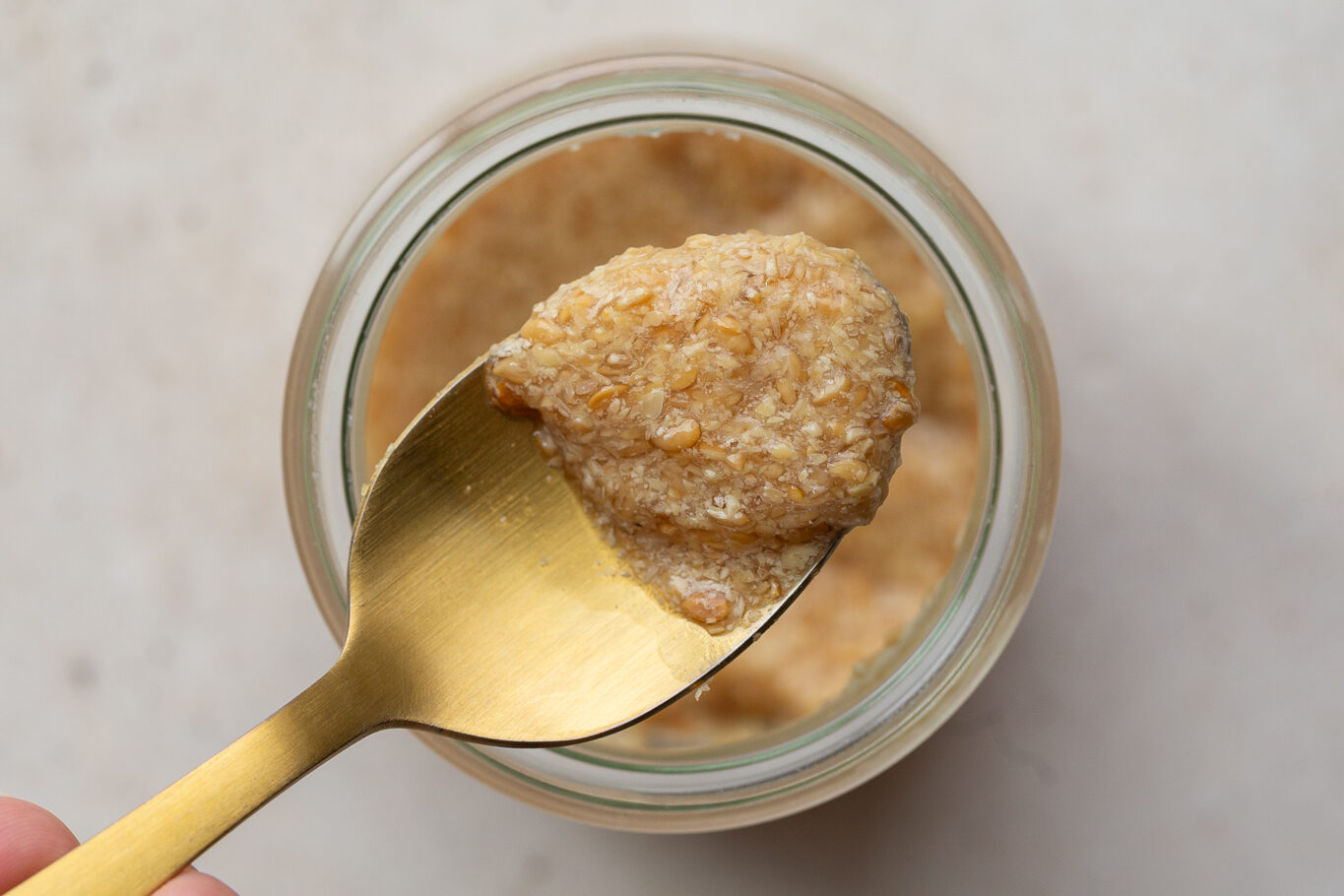 Flax egg on a spoon.