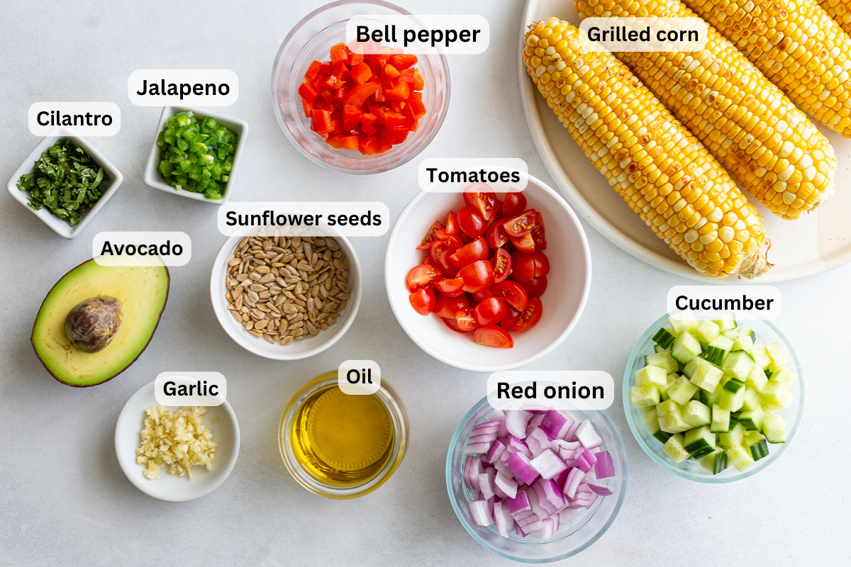 ingredients need to make grilled corn salad including grilled corn, bell pepper, jalapeno, cilantro, avocado, red onion etc