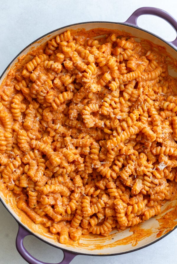 creamy tomato protein pasta in a large skillet