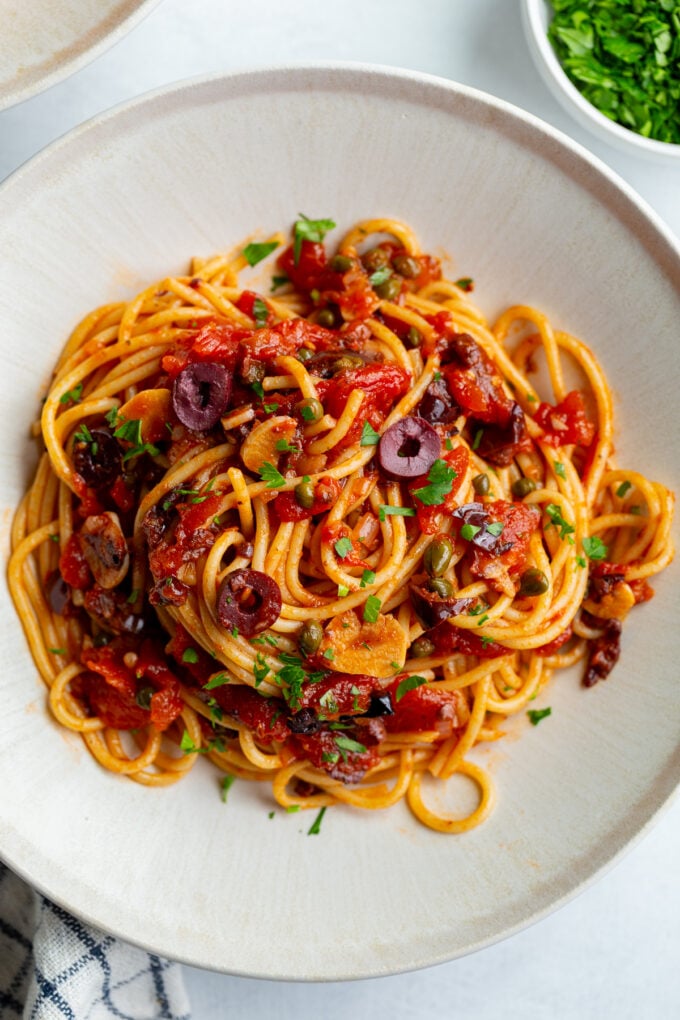 pasta alla puttanesca on a large plate