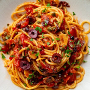 pasta alla puttanesca on a large plate
