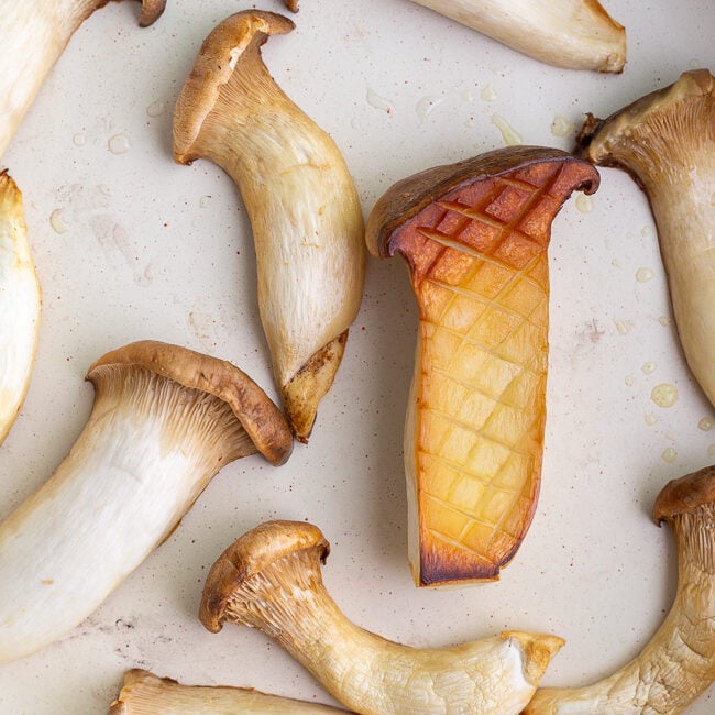 sauteed king oyster mushrooms in a skillet