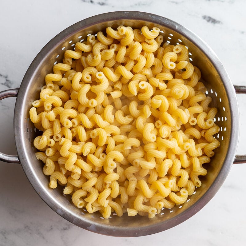 cooked cavatappi pasta in a strainer