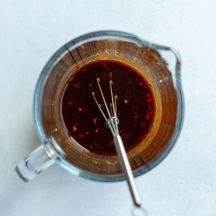 stir fry sauce whisked in a measuring cup