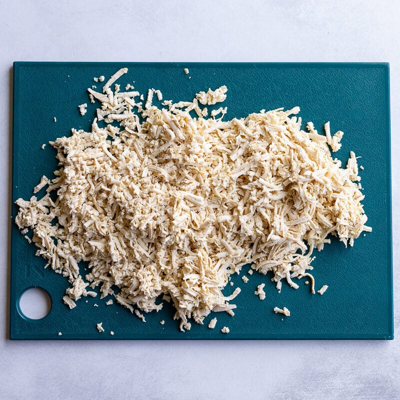 shredded tofu on a cutting board