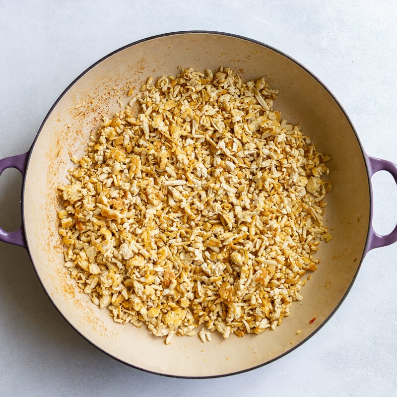 ground tofu in a large skillet