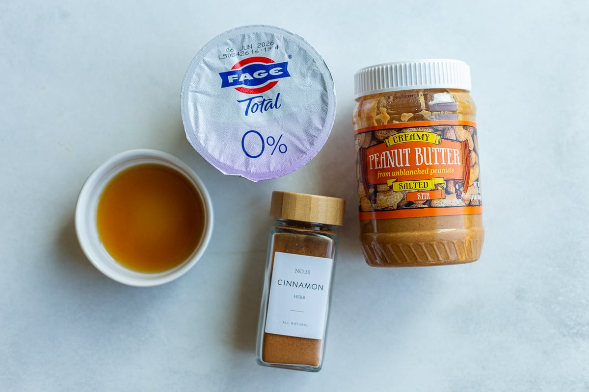 ingredients needed for healthy fruit dip: greek yogurt, maple syrup, cinnamon and maple syrup