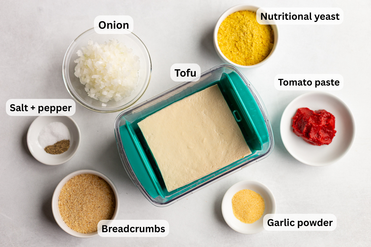 Labeled ingredients for tofu meatballs, including tofu, onion, breadcrumbs, nutritional yeast, tomato paste, and garlic powder.