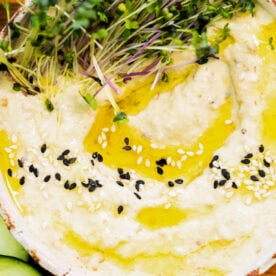 Baba Ganoush dip topped with a drizzle of olive oil and sesame seeds