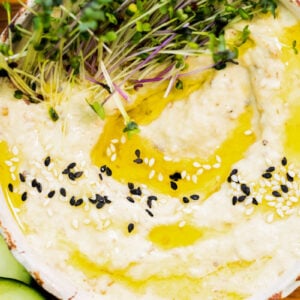 Baba Ganoush dip topped with a drizzle of olive oil and sesame seeds