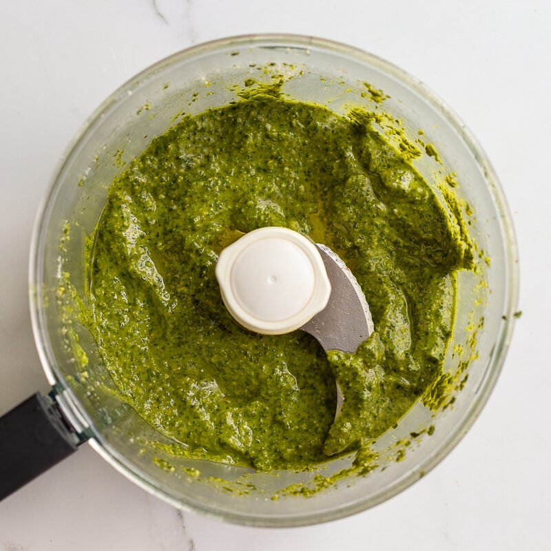 finished vegan pesto blended smooth with vegan parmesan mixed in