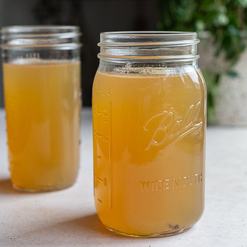 2 large mason jars of bone broth for dogs