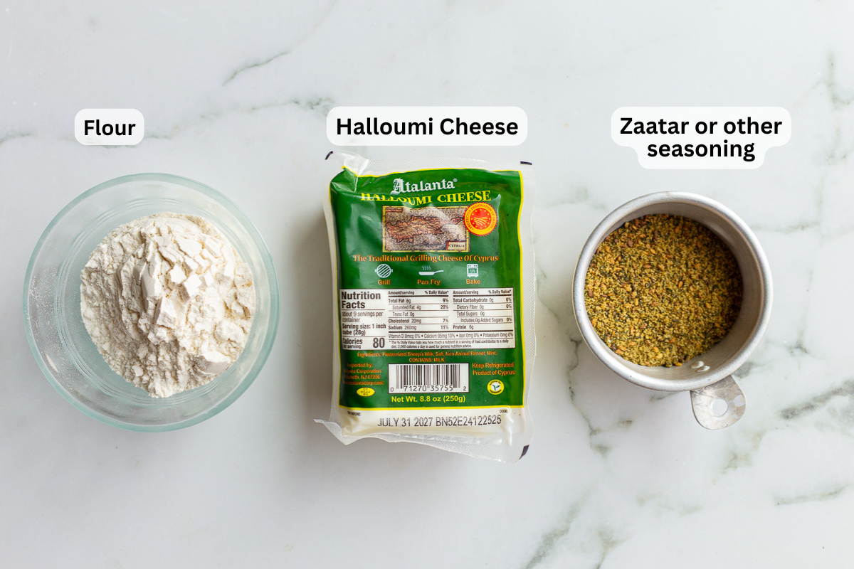 labeled ingredients needed for halloumi fries including spices, halloumi, and flour