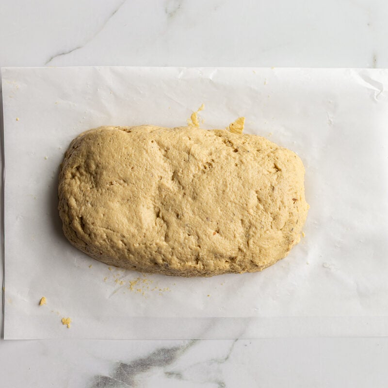 seitan dough formed in the shape of a roast before it's baked