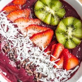 acai bowl topped with kiwi
