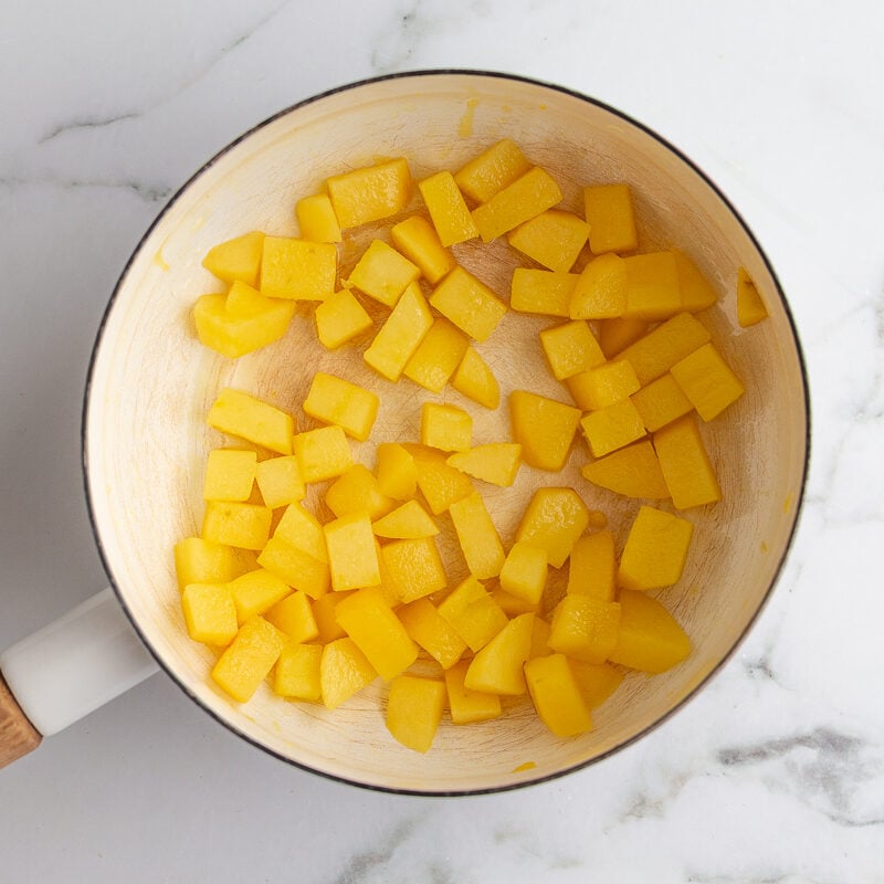 diced apples in a white pot