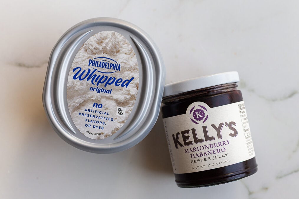 ingredients needed for pepper jelly cream cheese dip including whipped cream cheese and kellys pepper jelly jam